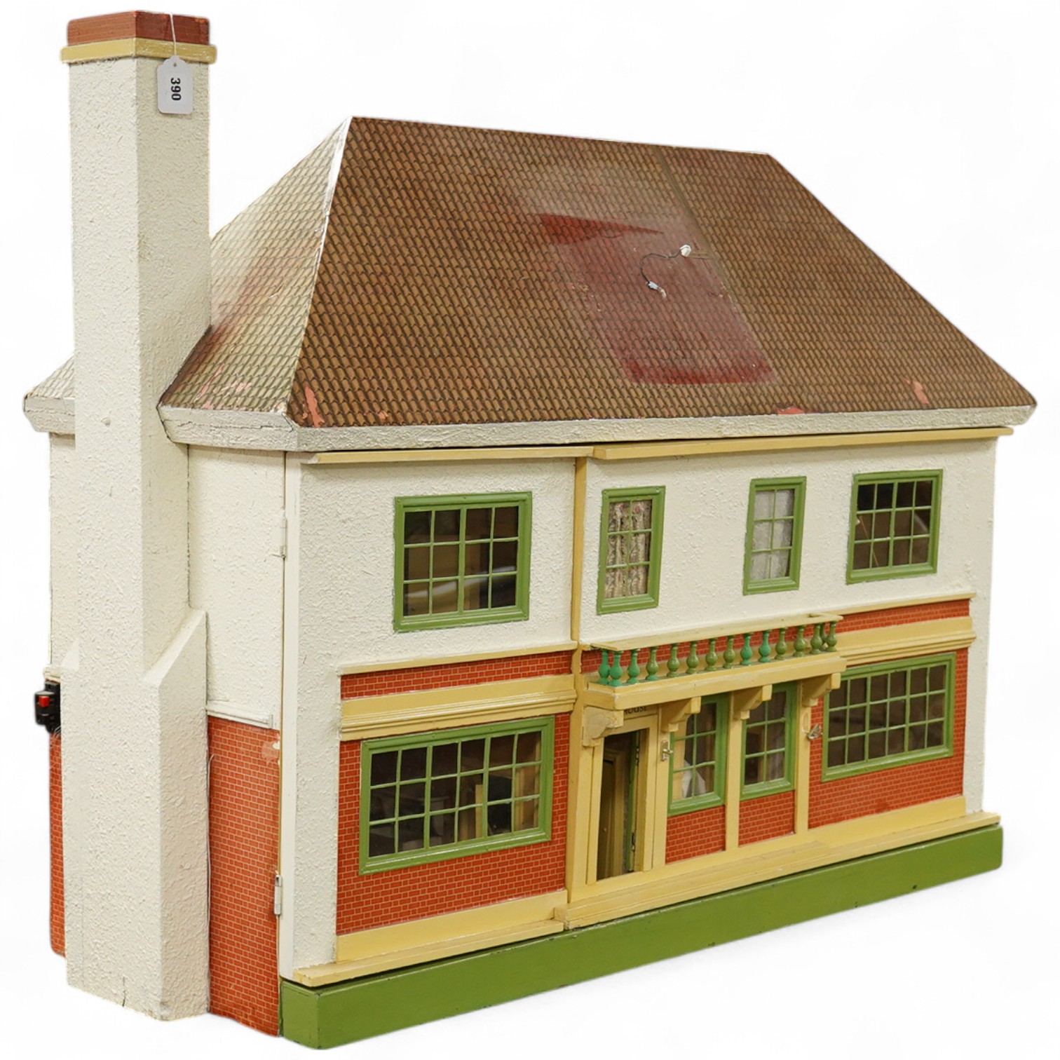 A modern ‘Vine House’ dolls house with furniture and accessories; a large six room house with hall and stairwell, the front wall opening in two sections on hinges each side, with internal decoration and lighting, width 1